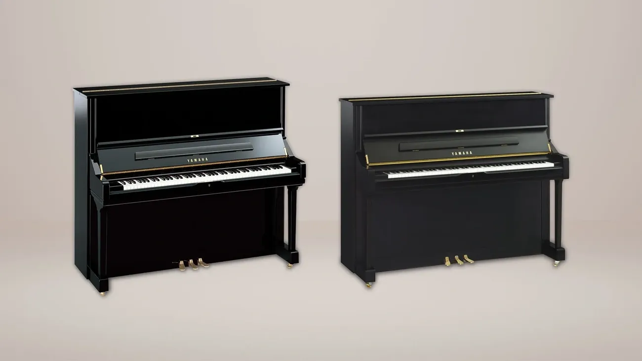 Side-by-side comparison of Yamaha U1 and U3 black upright pianos on a neutral background.