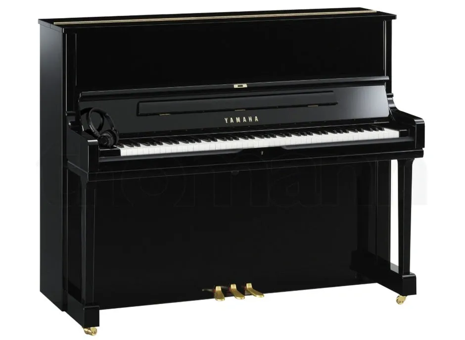 Black Yamaha upright piano with headphones resting on the keys, offered with free delivery and installation in Dubai, UAE.
